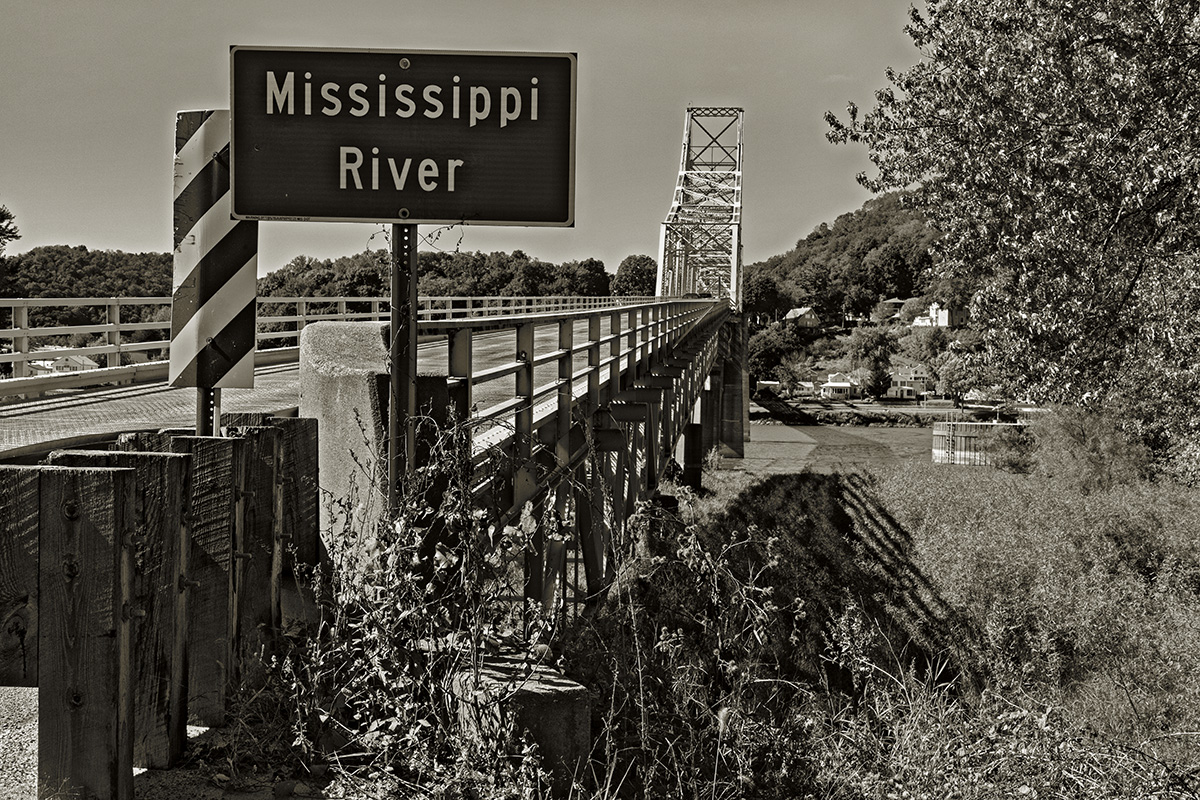 The Black Hawk Bridge (IA 9/ WI 82) joins Lansing, IA, and Crawford Township, WI.